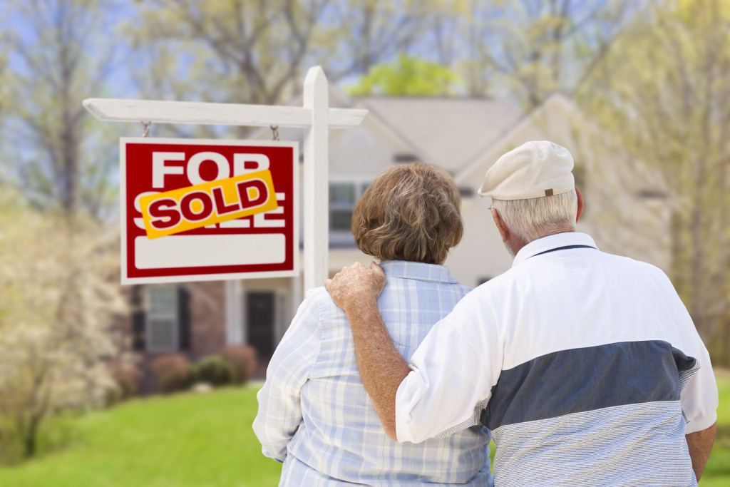 old couple buying a house