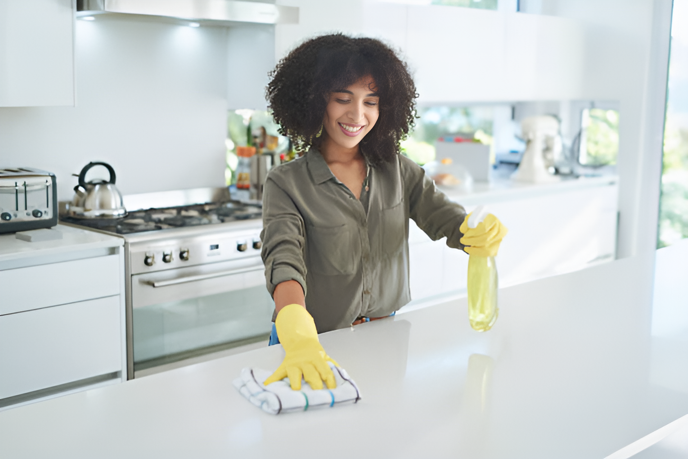 woman cleaning kitchen counters